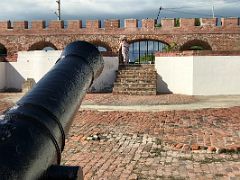 04C Looking past a huge cannon on the inside to the entrance to Fort Charles Port Royal Kingston Jamaica
